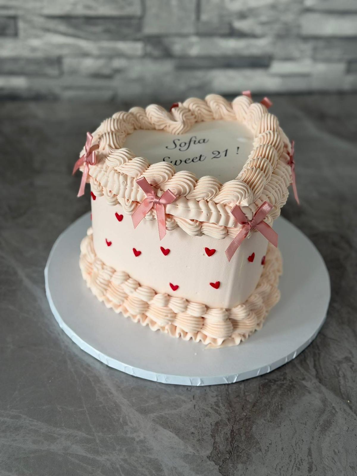Heart Shaped Birthday Cake with Pink Bows