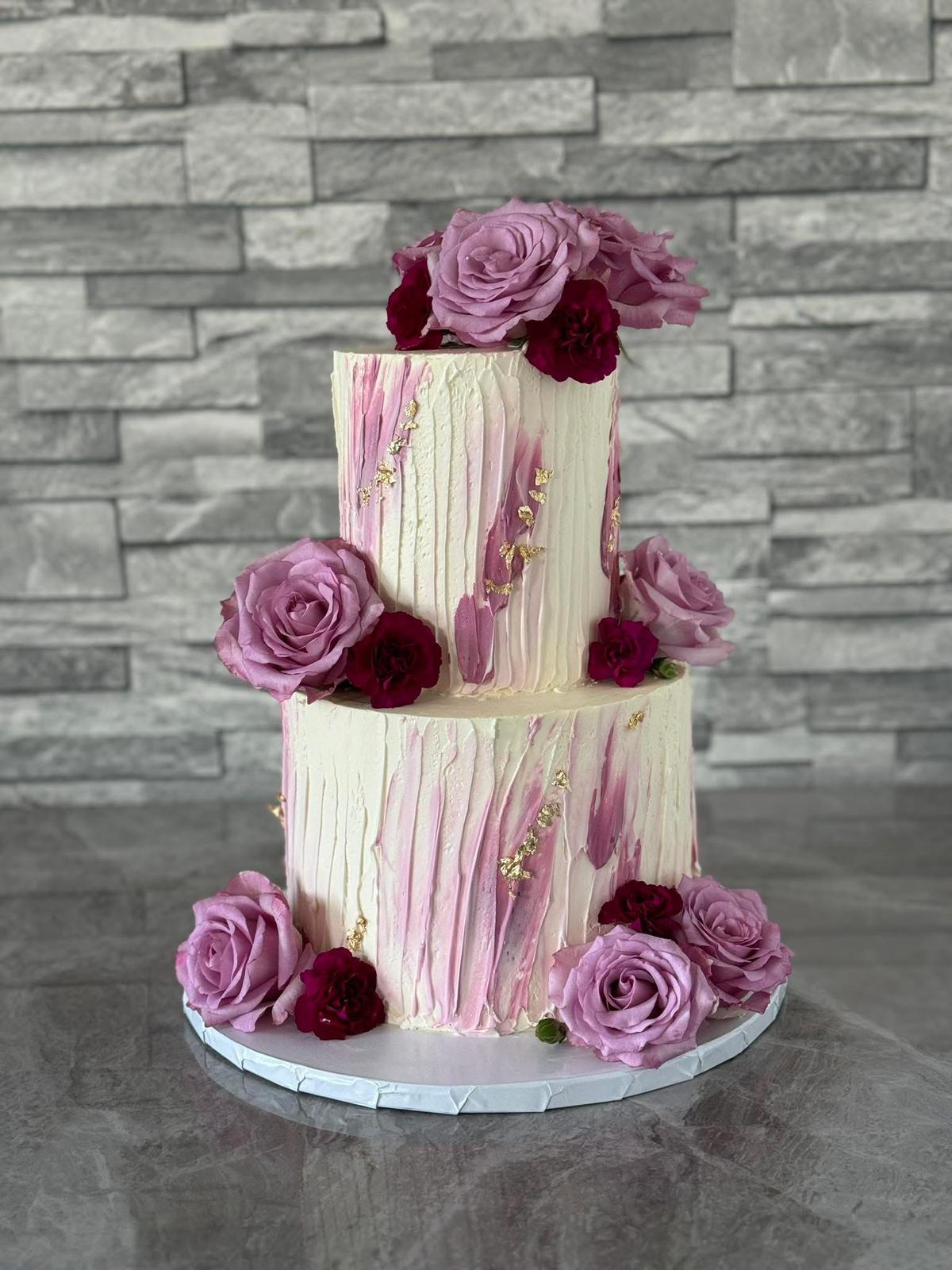 Wedding cake with pink roses